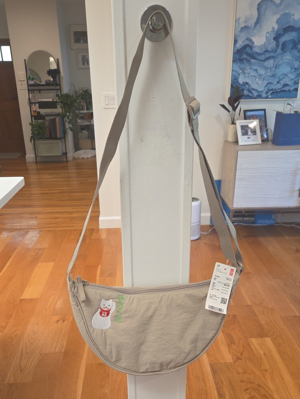 Uniqlo Unisex Beige Crescent Waterproof Crossbody Bag W/ Maneki-Neko Cat (NWT)